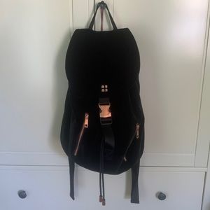 Black velvet backpack.  Hardly worn